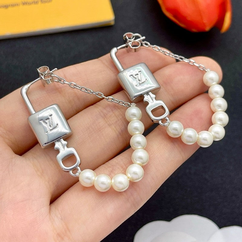 18K Louis Vuitton Pearl Lock Gold Earrings